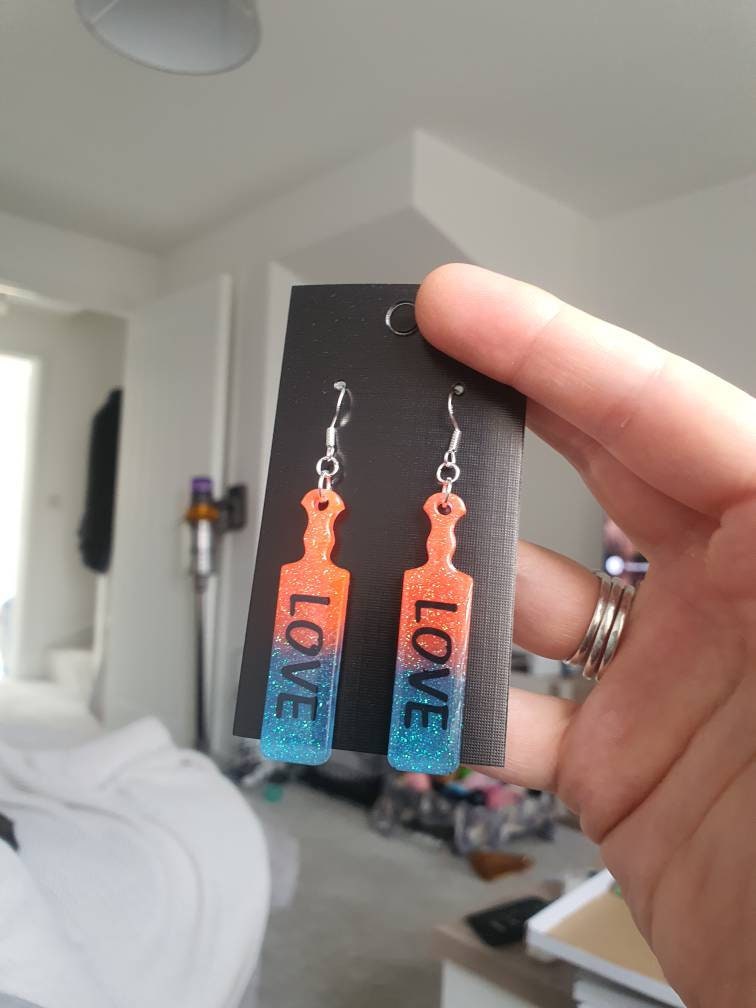 UV Active Glow Orange & Blue Love Paddle Resin Earrings