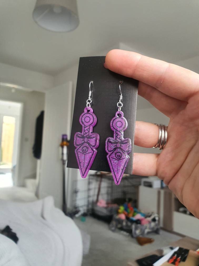UV Active Glow Purple Bow Kunai Resin Earrings