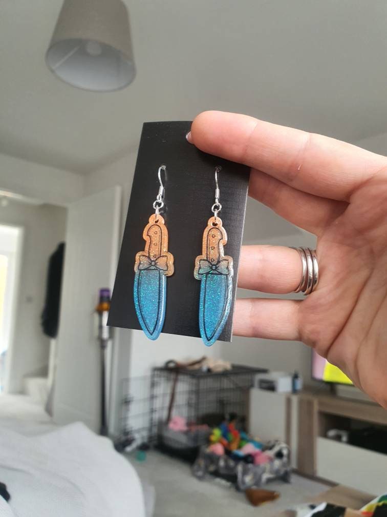 UV Active Glow Orange & Blue Bow Knife Resin Earrings