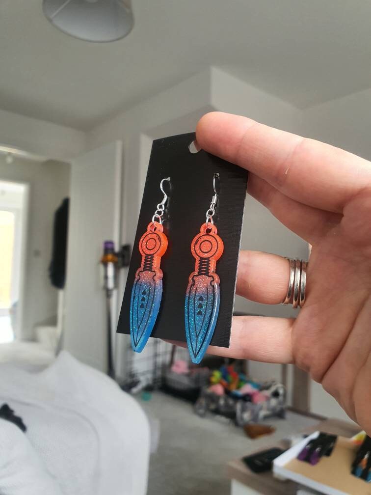 UV Active Glow Pink & Blue Throwing Knife Resin Earrings