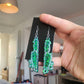 Colour Shift Green Dripping Knife Resin Earrings