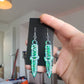 Colour Shift Green Dagger Resin Earrings