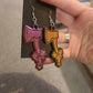 Colour Shift Bow Axe Resin Earrings