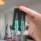 Colour Shift Green Dagger Resin Earrings