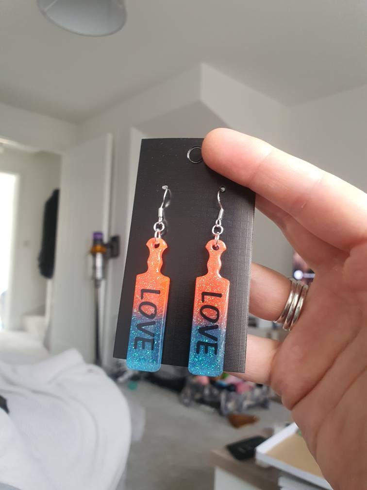 UV Active Glow Orange & Blue Love Paddle Resin Earrings