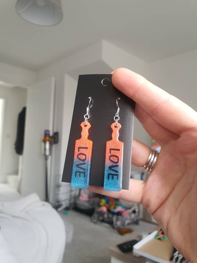 UV Active Glow Orange & Blue Love Paddle Resin Earrings