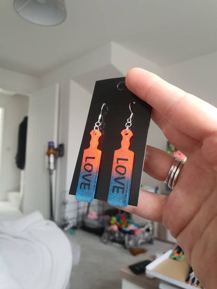 UV Active Glow Orange & Blue Love Paddle Resin Earrings