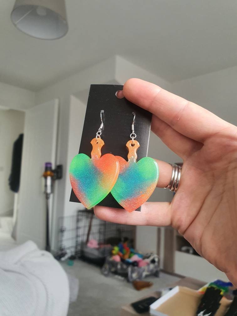 UV Active Glow Heart Paddle Resin Earrings