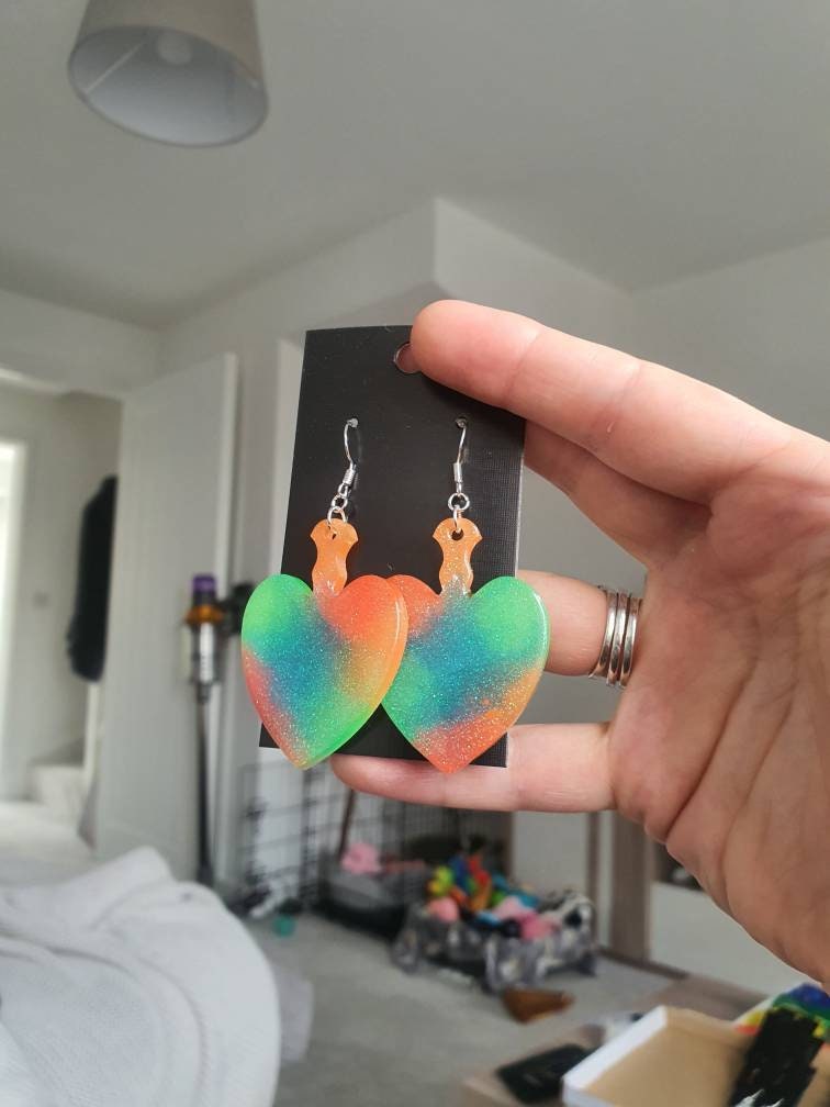 UV Active Glow Heart Paddle Resin Earrings