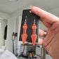 UV Active Glow Pink Kunai Resin Earrings