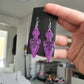 UV Active Glow Purple Bow Kunai Resin Earrings