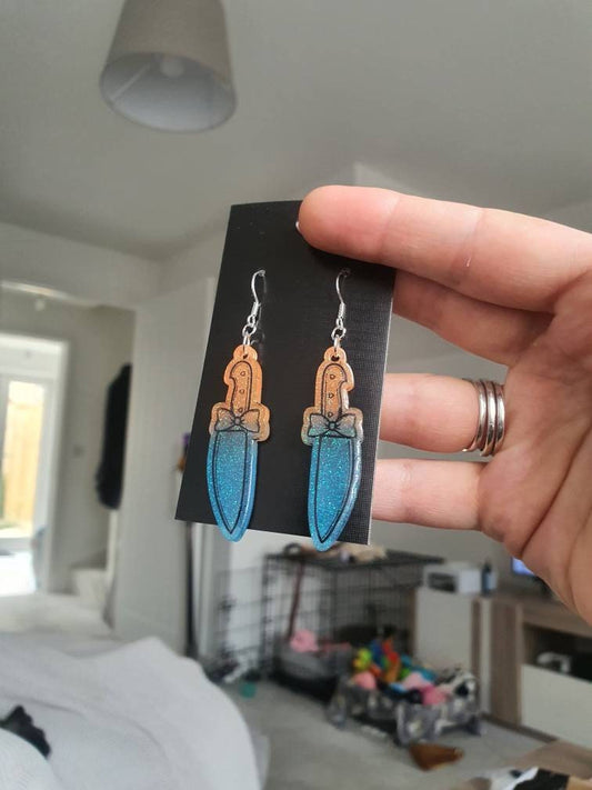 UV Active Glow Orange & Blue Bow Knife Resin Earrings
