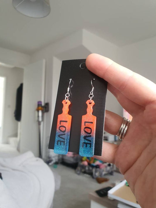 UV Active Glow Orange & Blue Love Paddle Resin Earrings