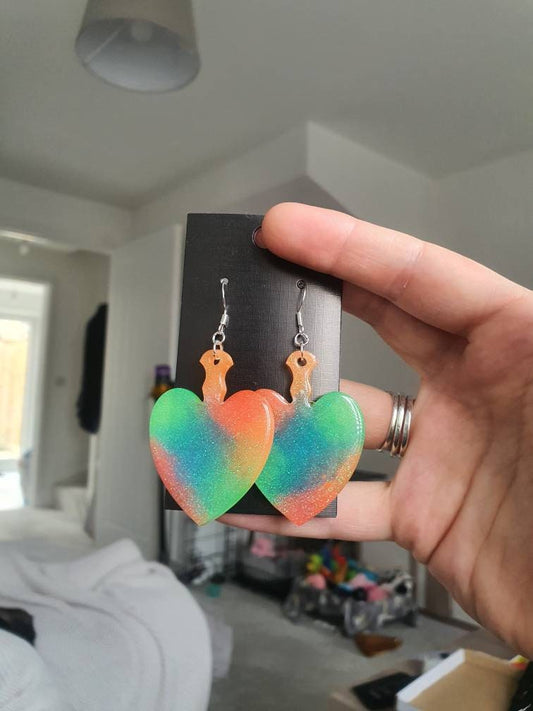 UV Active Glow Heart Paddle Resin Earrings