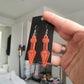 UV Active Glow Pink Kunai Resin Earrings