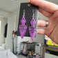 UV Active Glow Purple Bow Kunai Resin Earrings